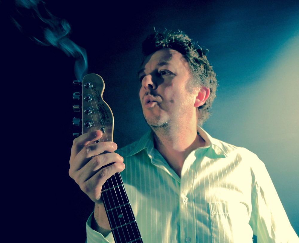 Patrick Shawcross with guitar